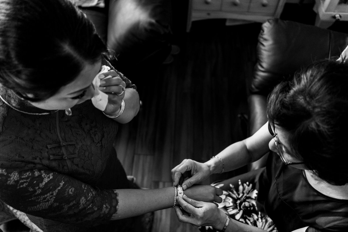 Bride crying during the tea ceremony