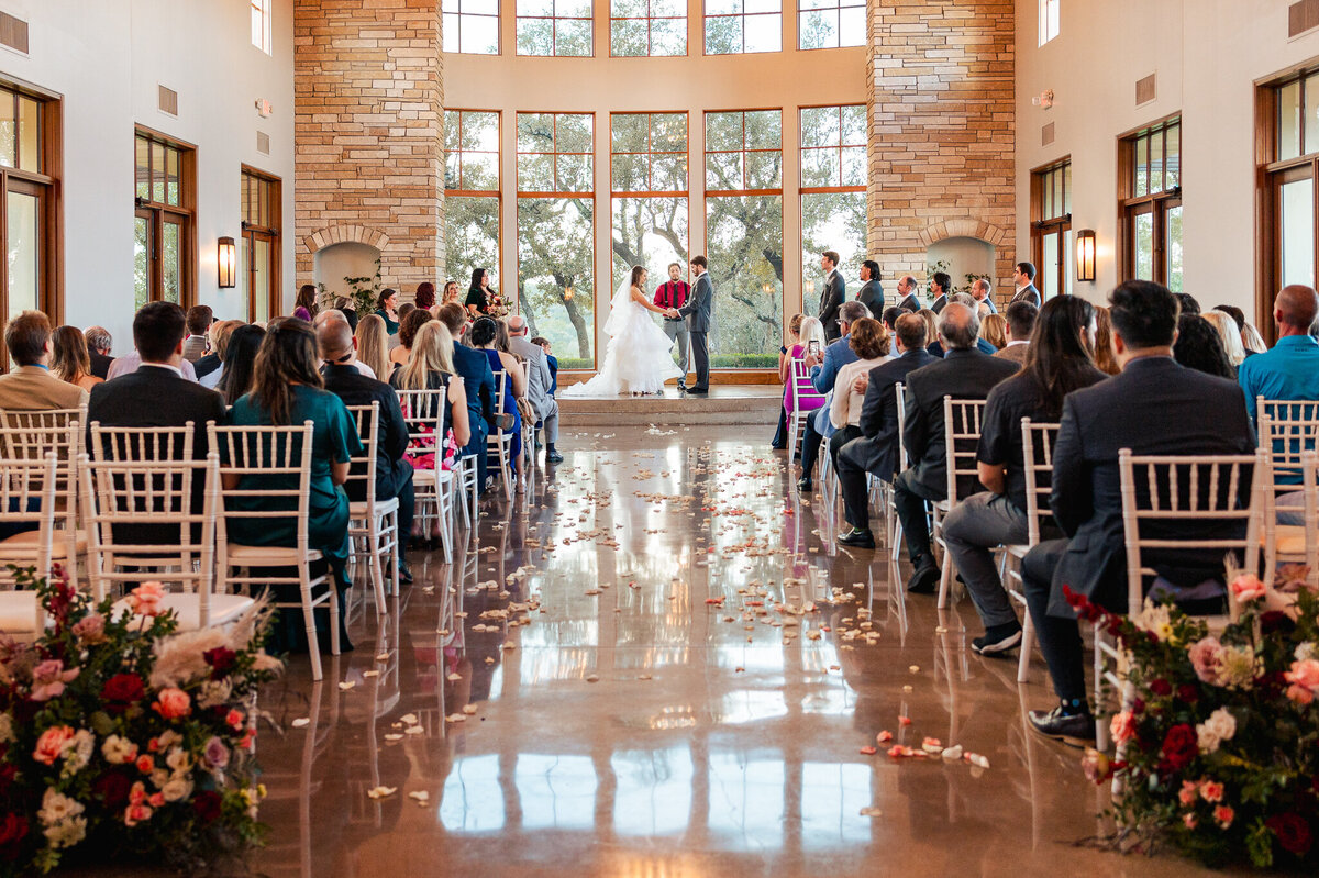 Witness a spectacular fall wedding at Canyonwood Ridge. Jewel-tone dresses, lavish florals, and the promise of a relaxed celebration filled with love.
