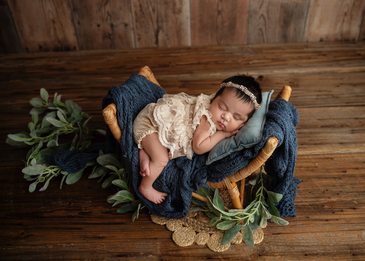 colleyville newborn girl on a bed
