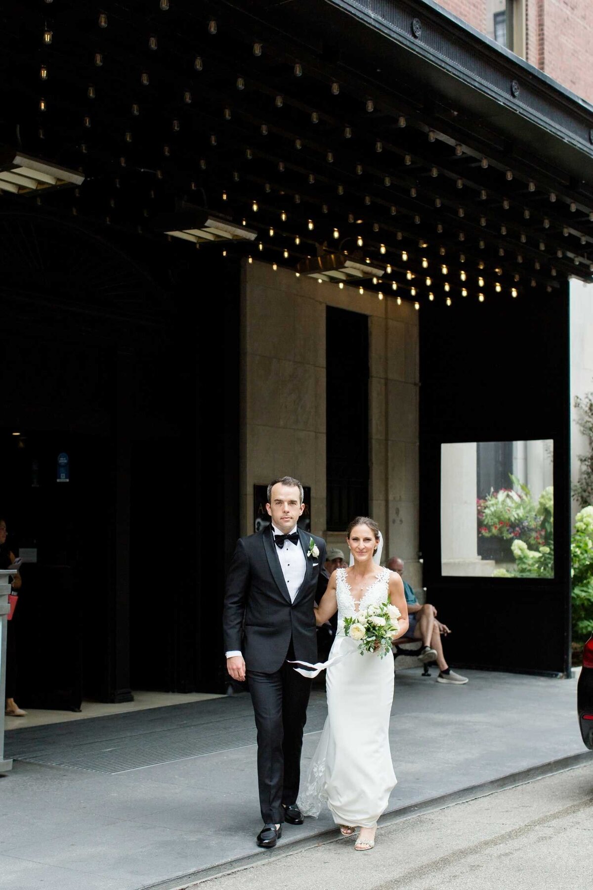 Bride and Groom city street portraits at the Ambassador Hotel before their Luxury Chicago Outdoor Historic Wedding Venue.