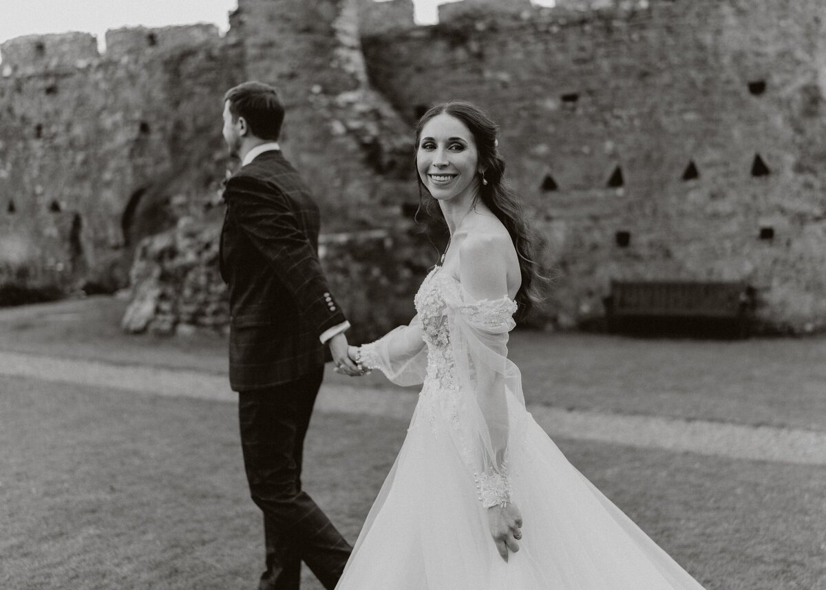 Bride and groom have their couple portraits in the castle