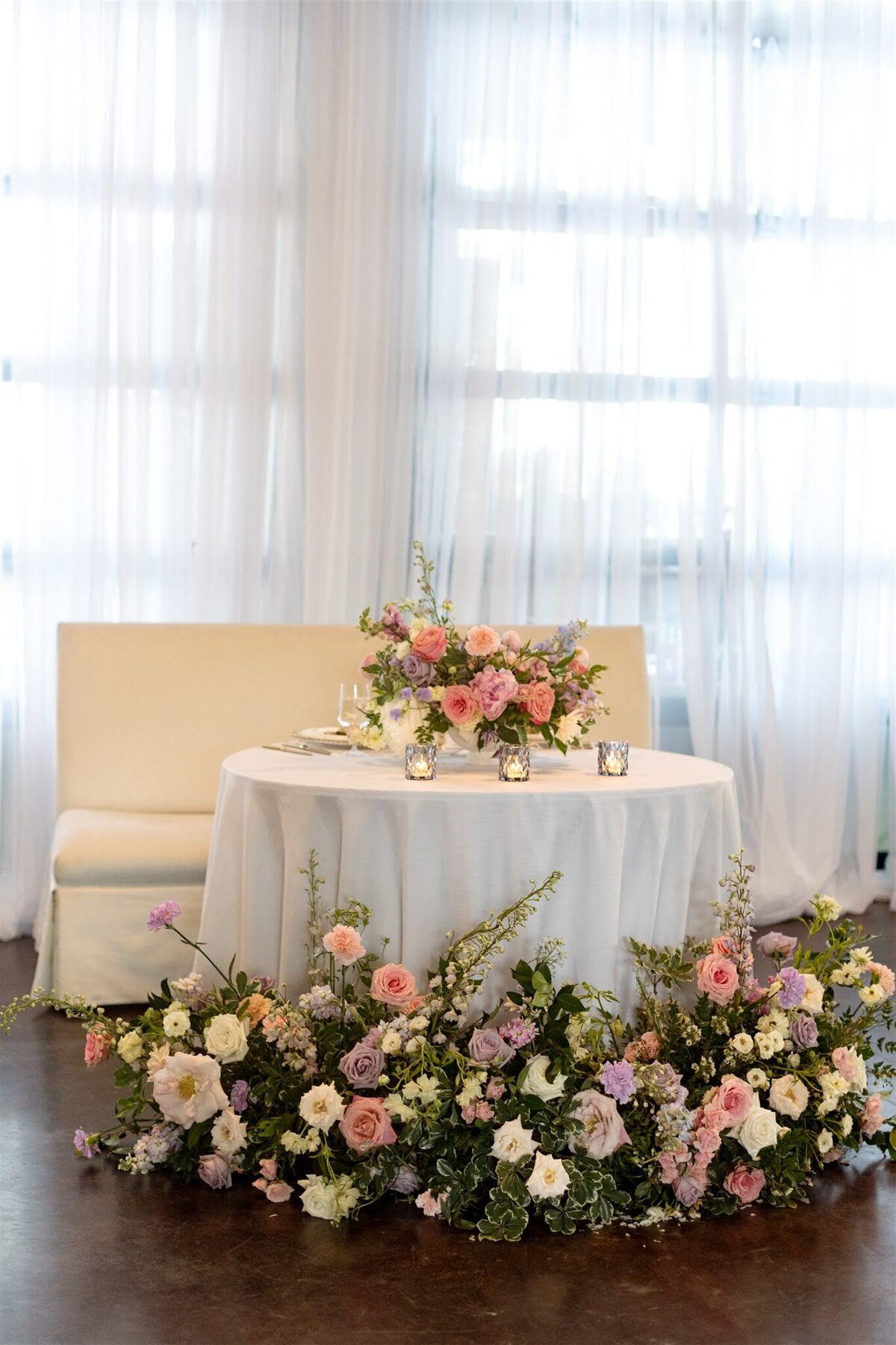 Sweetheart table wedding flowers spring florals The Estate at Cherokee Dock