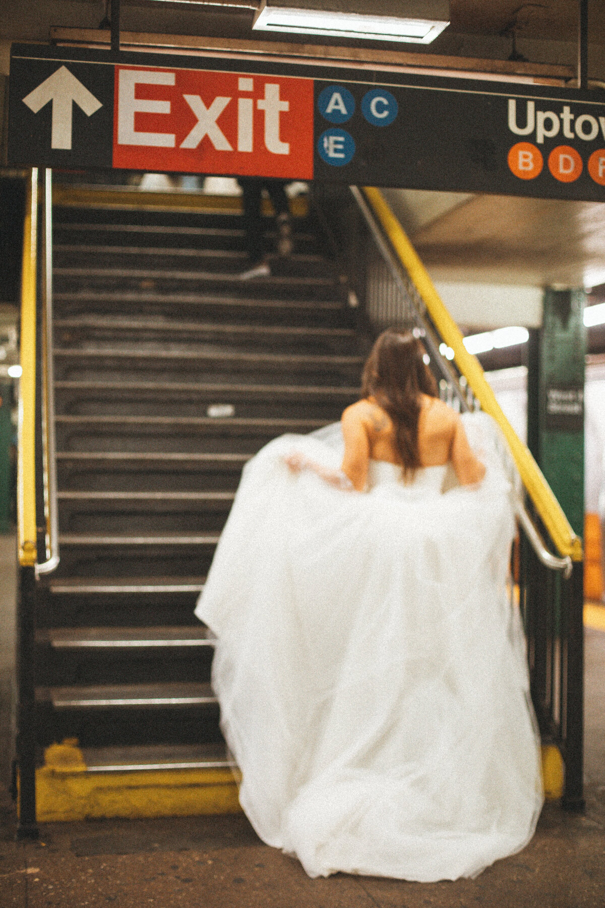 nyc bride on subway stairs