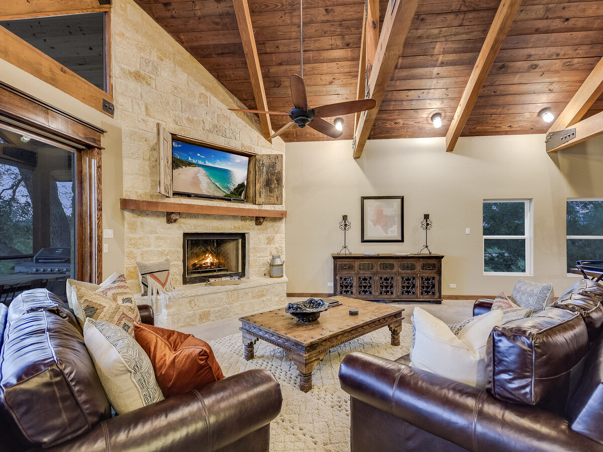 Seated living area with wooden ceilings