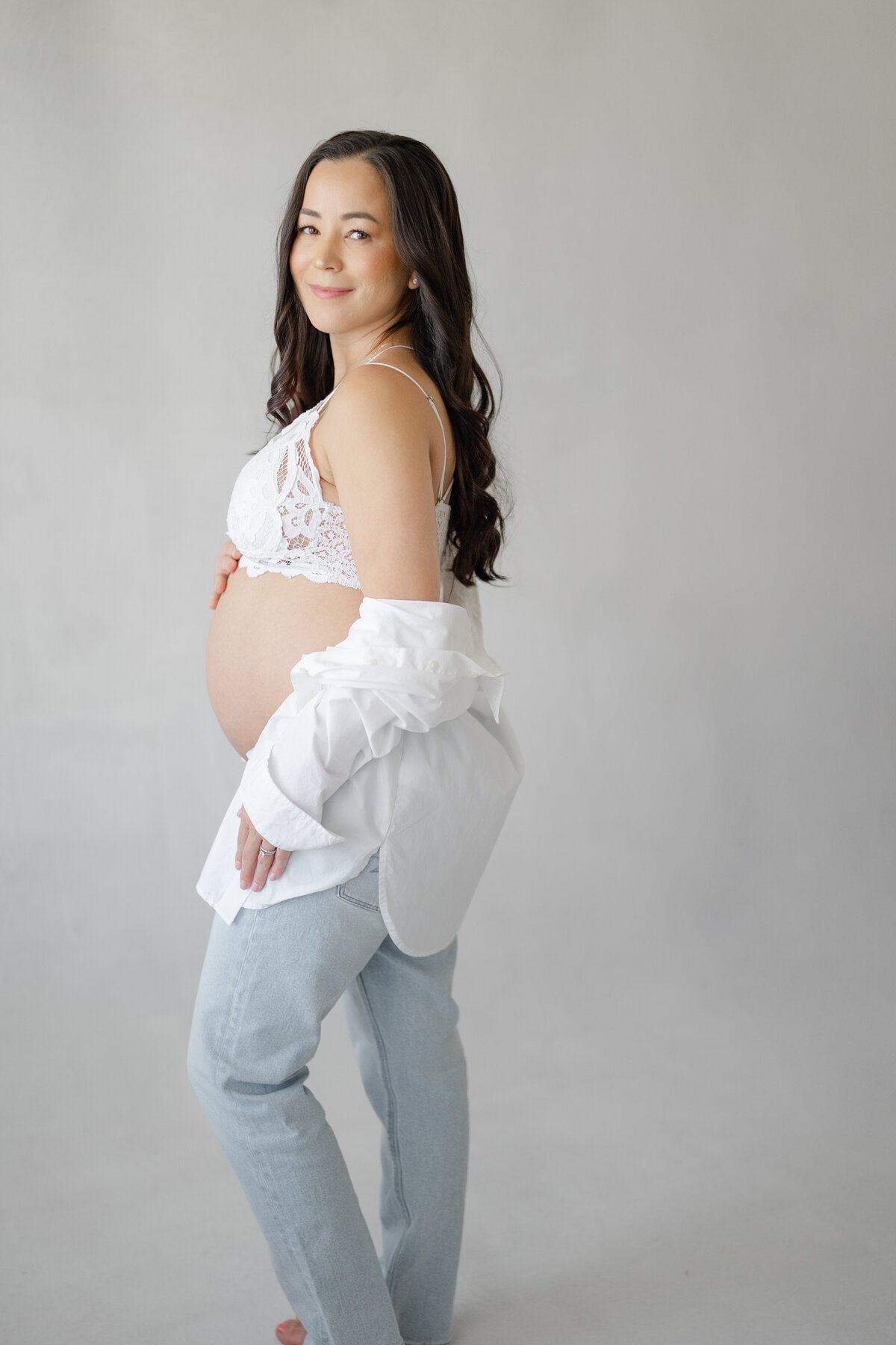 Elegant maternity portrait of Lori and Christina in Tampa natural light studio