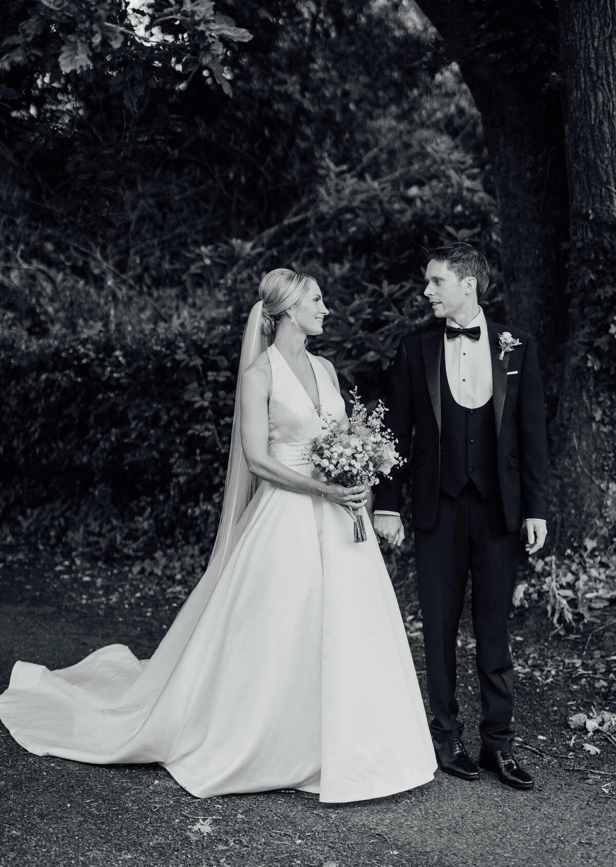 wexford-photos-of-couple-in-garden-holding hands