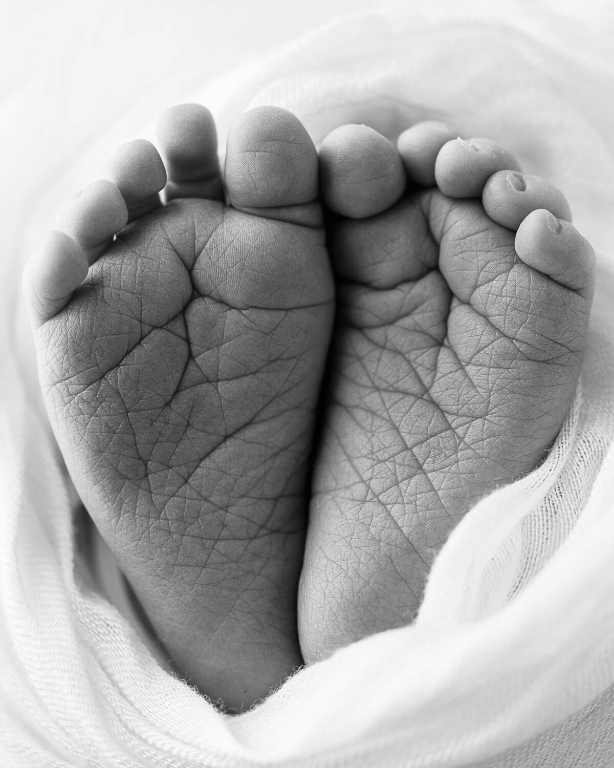 close up of crinkly baby feet