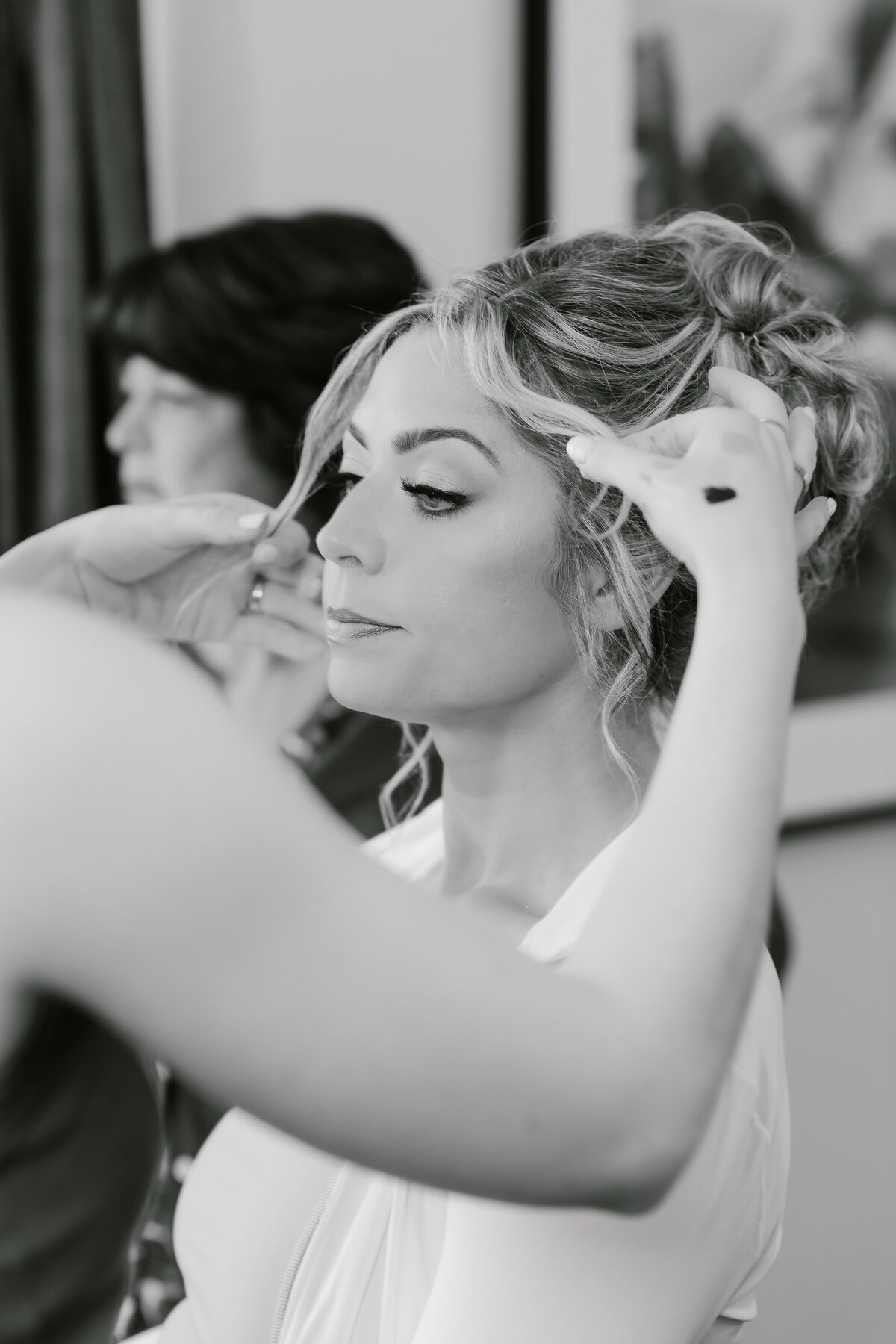 Bride getting make up done