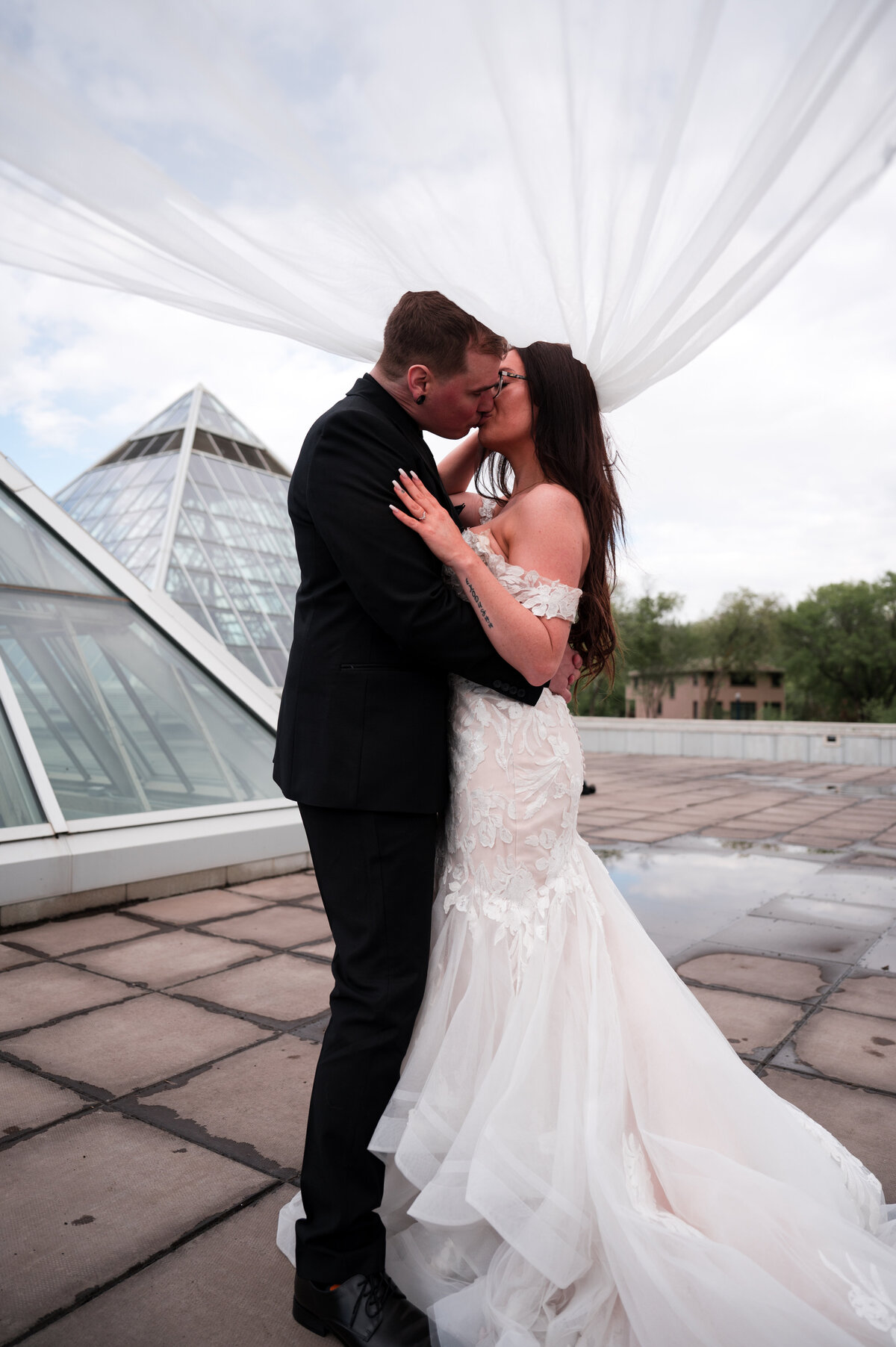 bride and groom kiss 