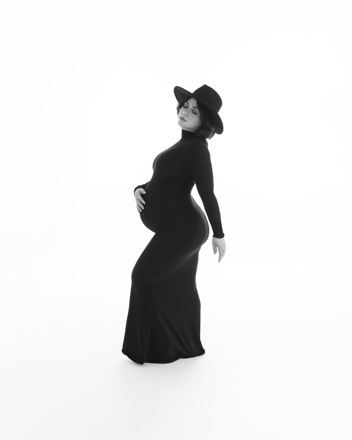 Maternity silhouette portrait on a white background