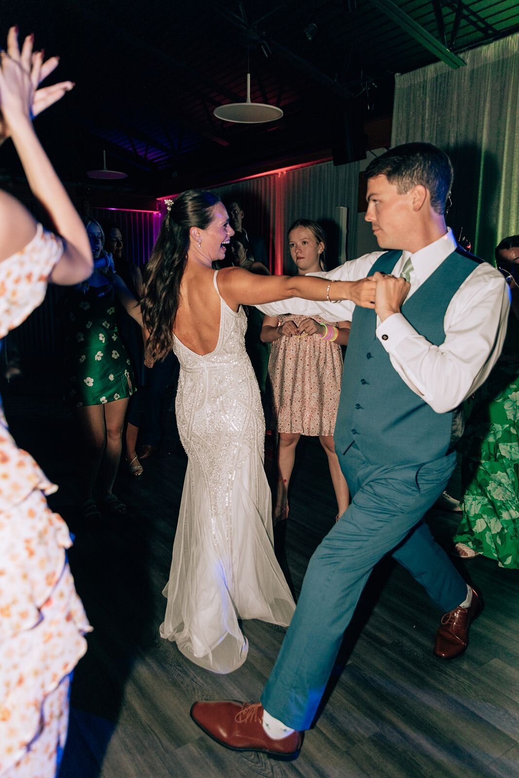 bride and groom dancing together during open dance floor