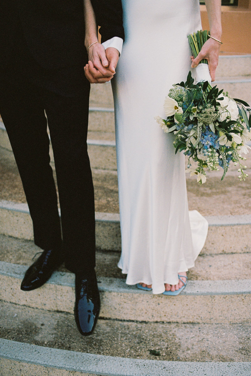 Detail of the bride and groom’s shoes and wedding flowers at a Melbourne micro-wedding, captured on 35mm film