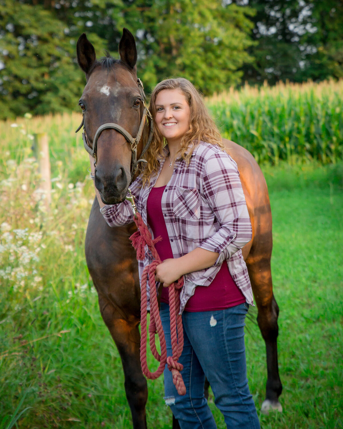 Equestrian portrait of senior girl with horse in Penn Yan, NY
