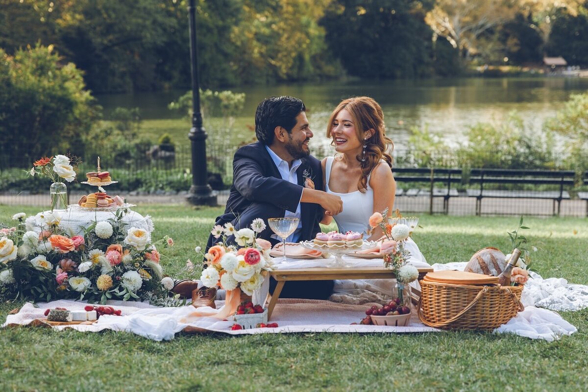 Intimate post-vow champagne celebration picnic