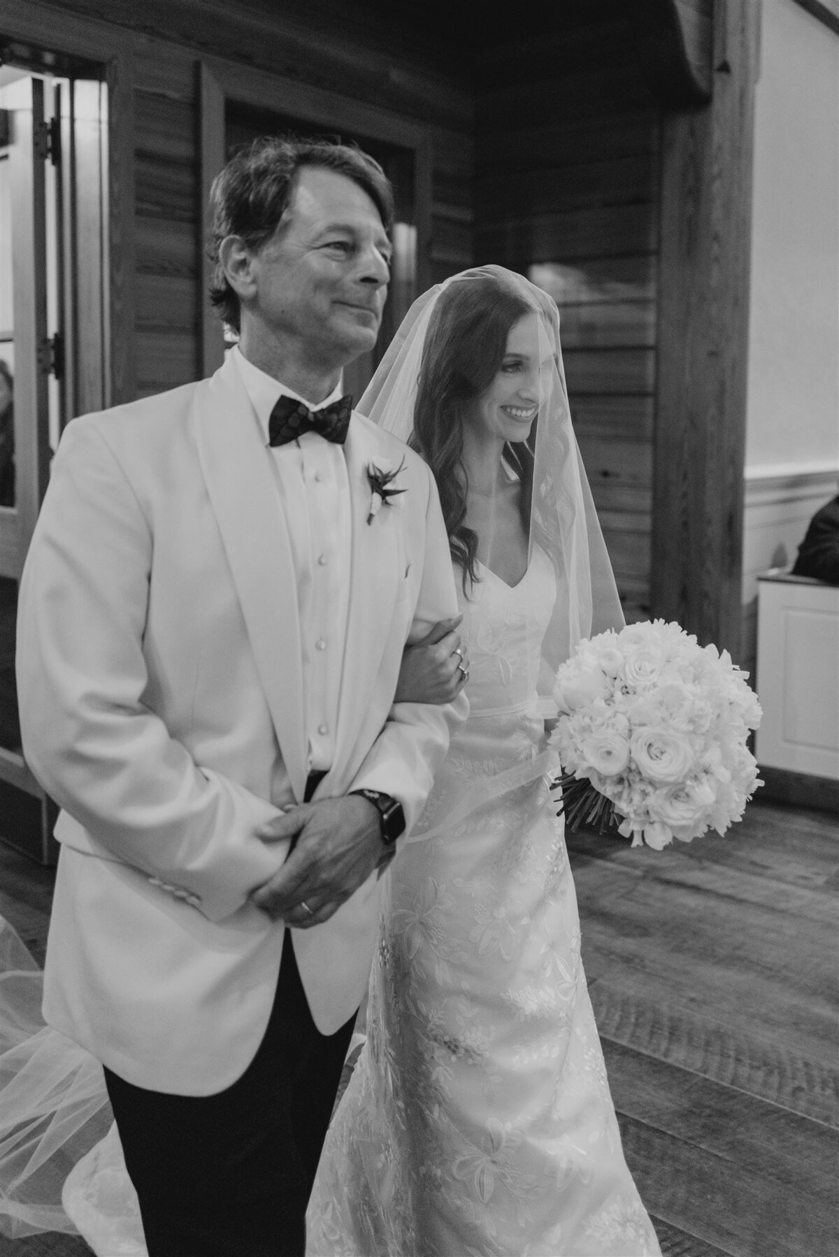 Father of bride walks bride down the aisle