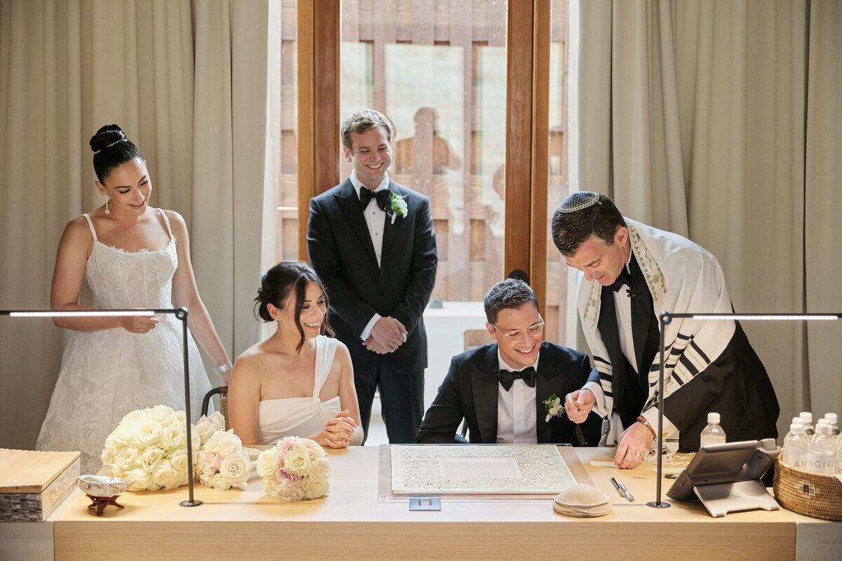 Bride and groom at their ketubah signing at Amangiri Utah