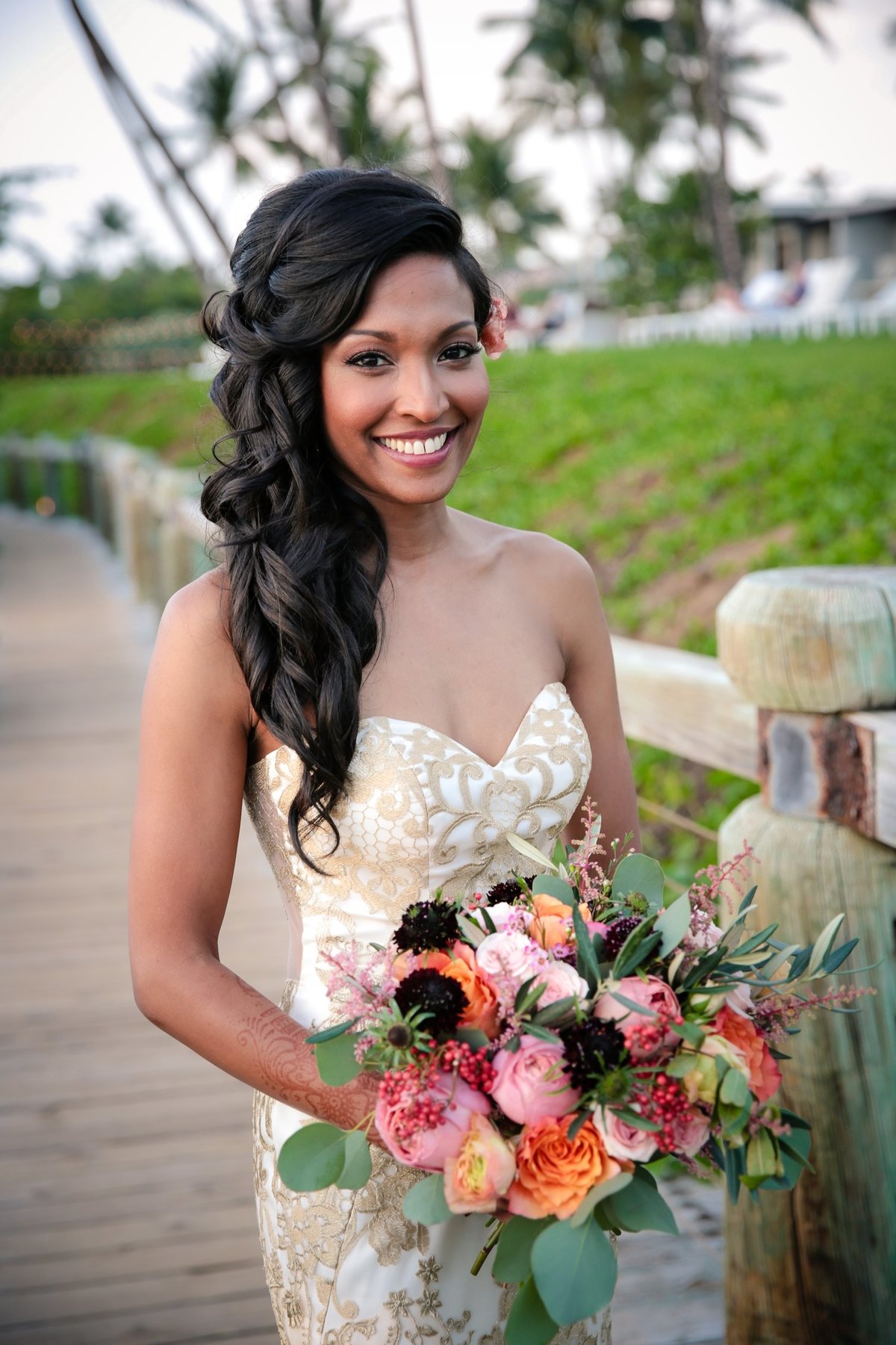 Maui Wedding Photography at The Andaz Maui Wailea of the bride with her bouquet