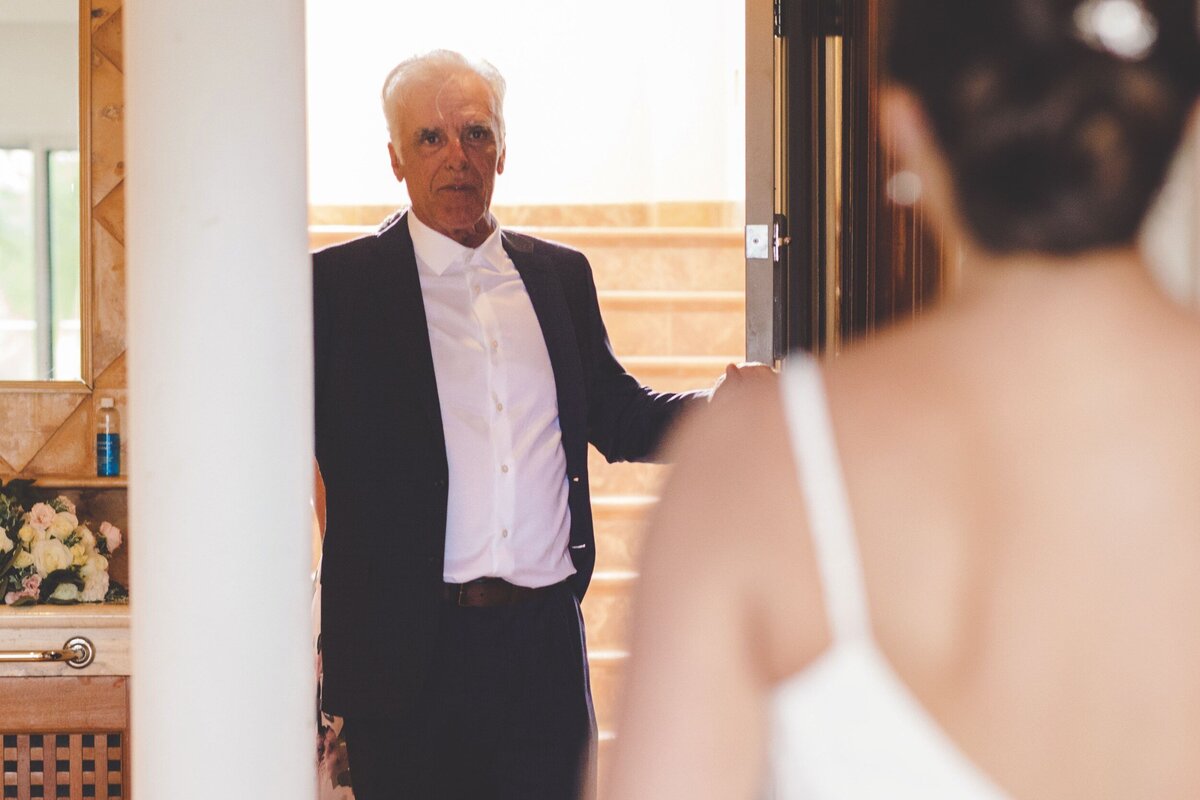 Brides first look with father at wedding in Riviera Maya