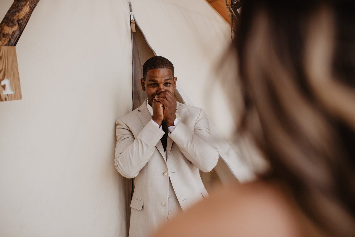 Utah Elopement Photographer captures groom being surprised seeing bride for first time