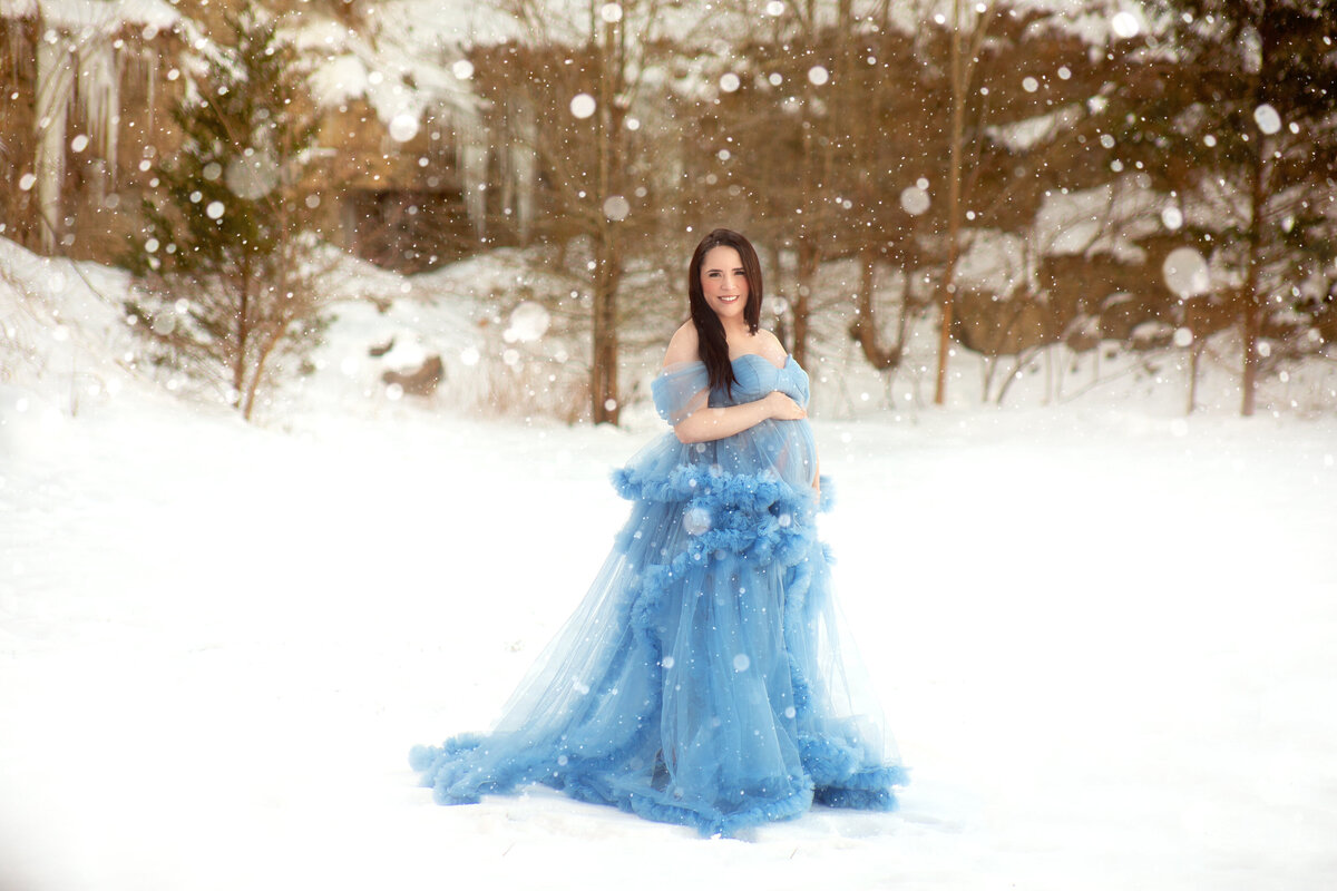 Women wearing blue dress being posed by Nashville, Photographer 