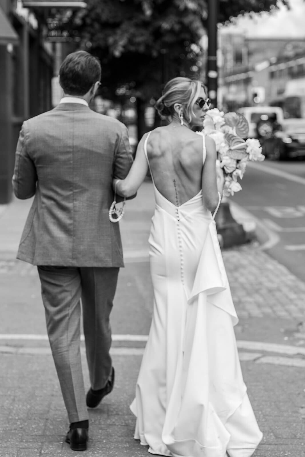 London wedding photography bride and groom on street