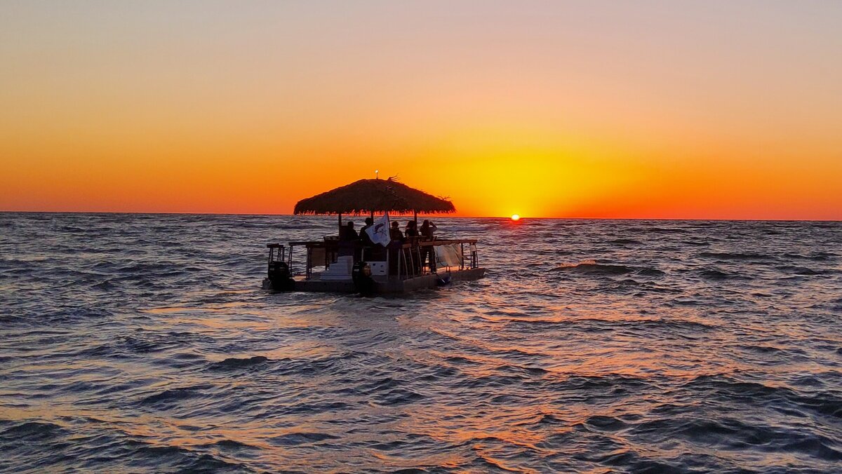 Sunset cruise Tiki Boat Johns pass Madeira Beach St Pete Levique tours