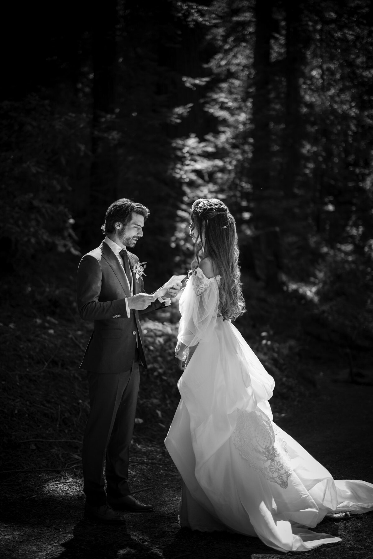A groom reads his vows at a destination wedding at Nestldown in Los Gatos, California