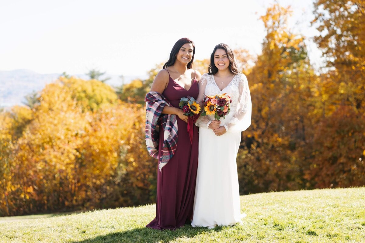 sisters on wedding day getting pictures taken at Steele Hill
