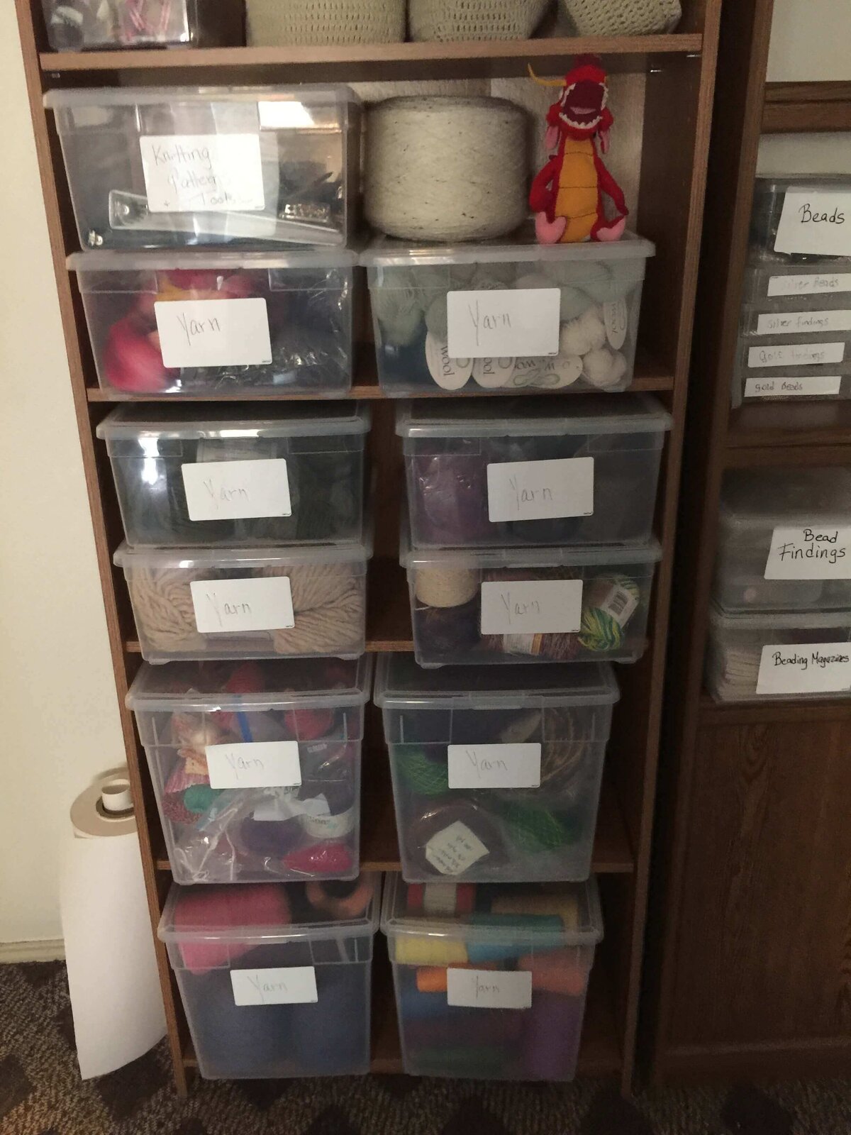 Organized storage space with labeled bins