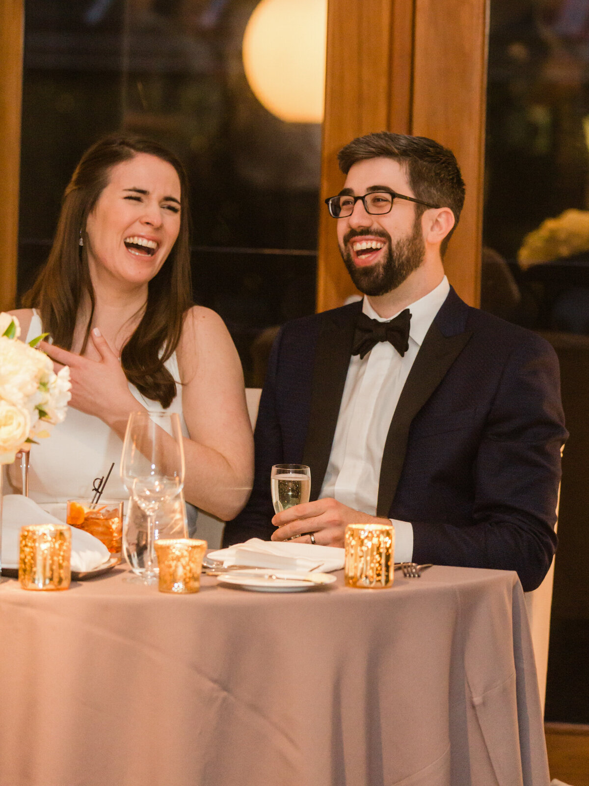 A candid moment during a wedding reception at the Ivy Room in Chicago