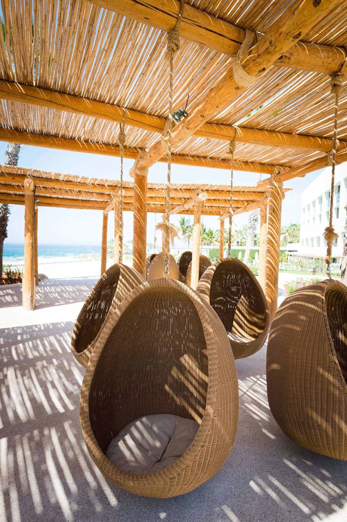 Unique wicker hanging pods outside resort define the atmosphere at Mauna Lani Hotel.