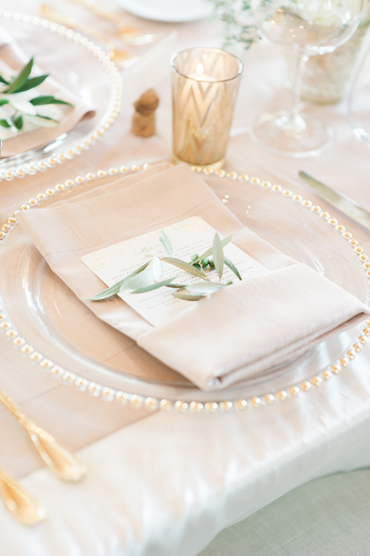 blush table napkin at place setting on wedding table at ponzi winery