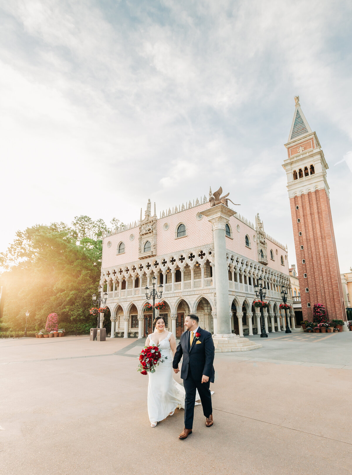Newlywed couple holding hands walking in Italy Pavilion at Walt Disney World Epcot