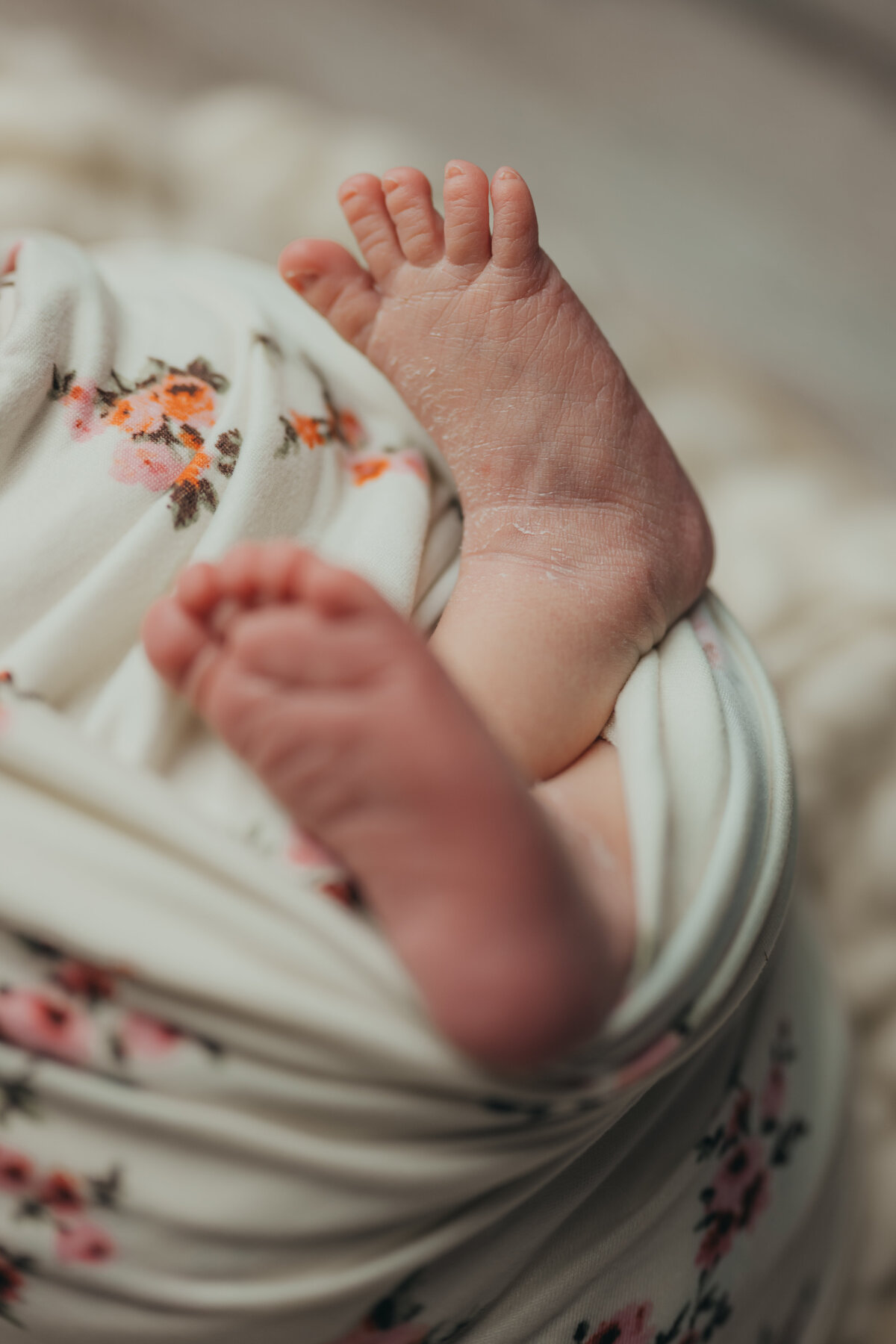 newborn-baby-girl-feet-closeup