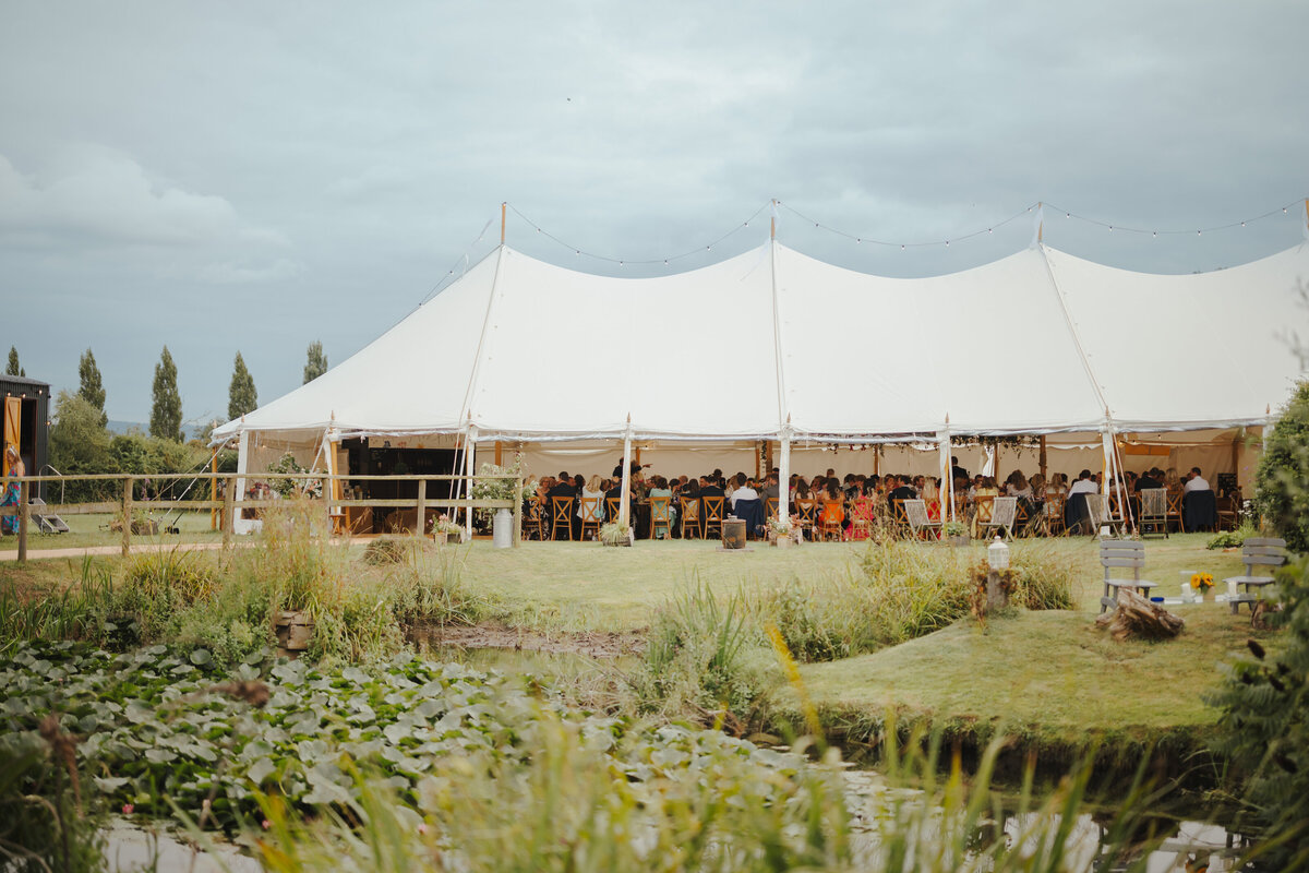 Traditional four pole marquee in garden