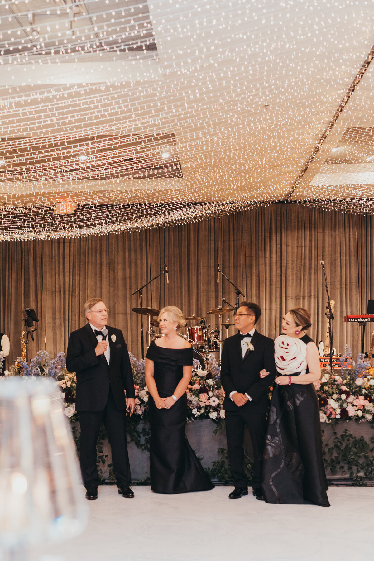 paretns of the newlyweds share toasts celebrating their children