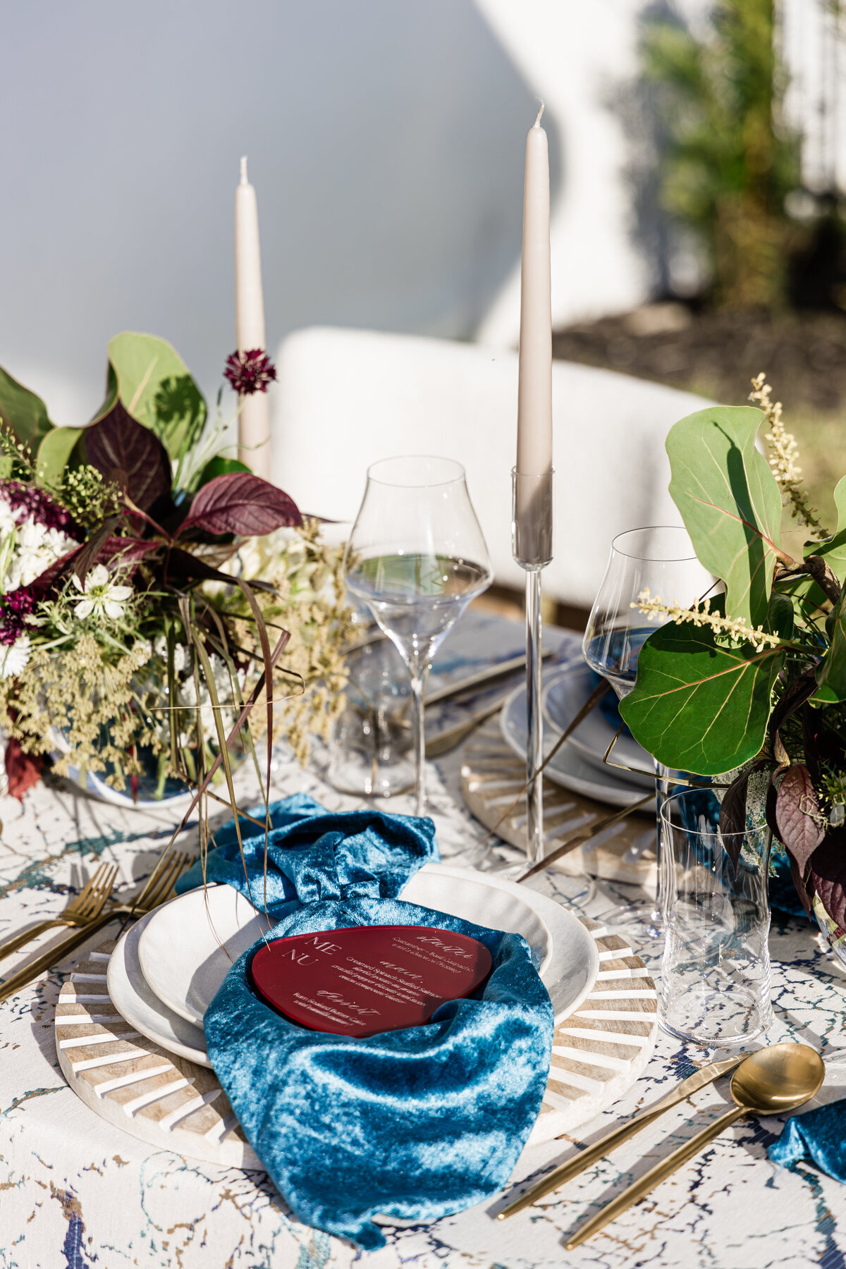nautical themed tablescape with seagrass centerpiece