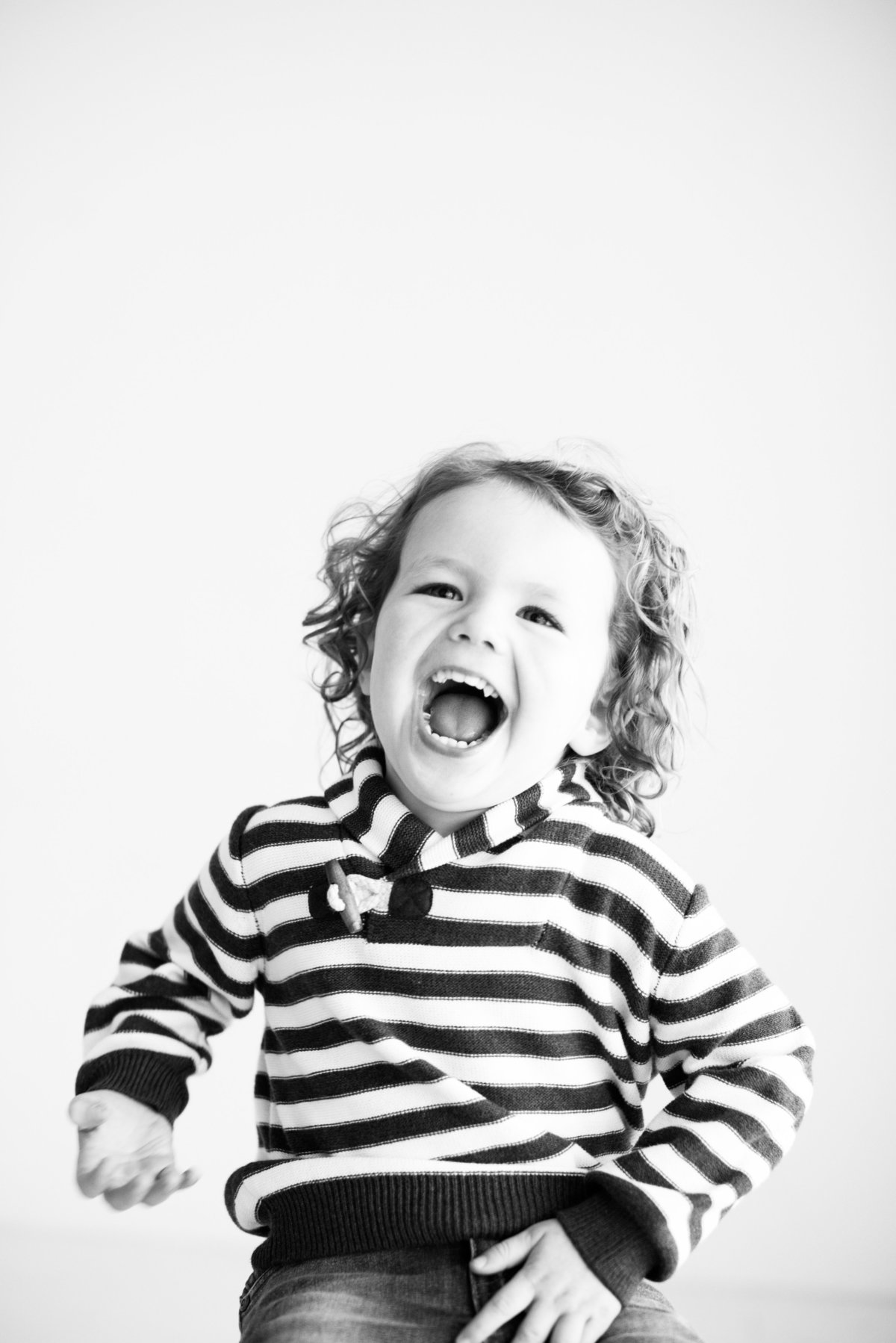 toddler boy laughing