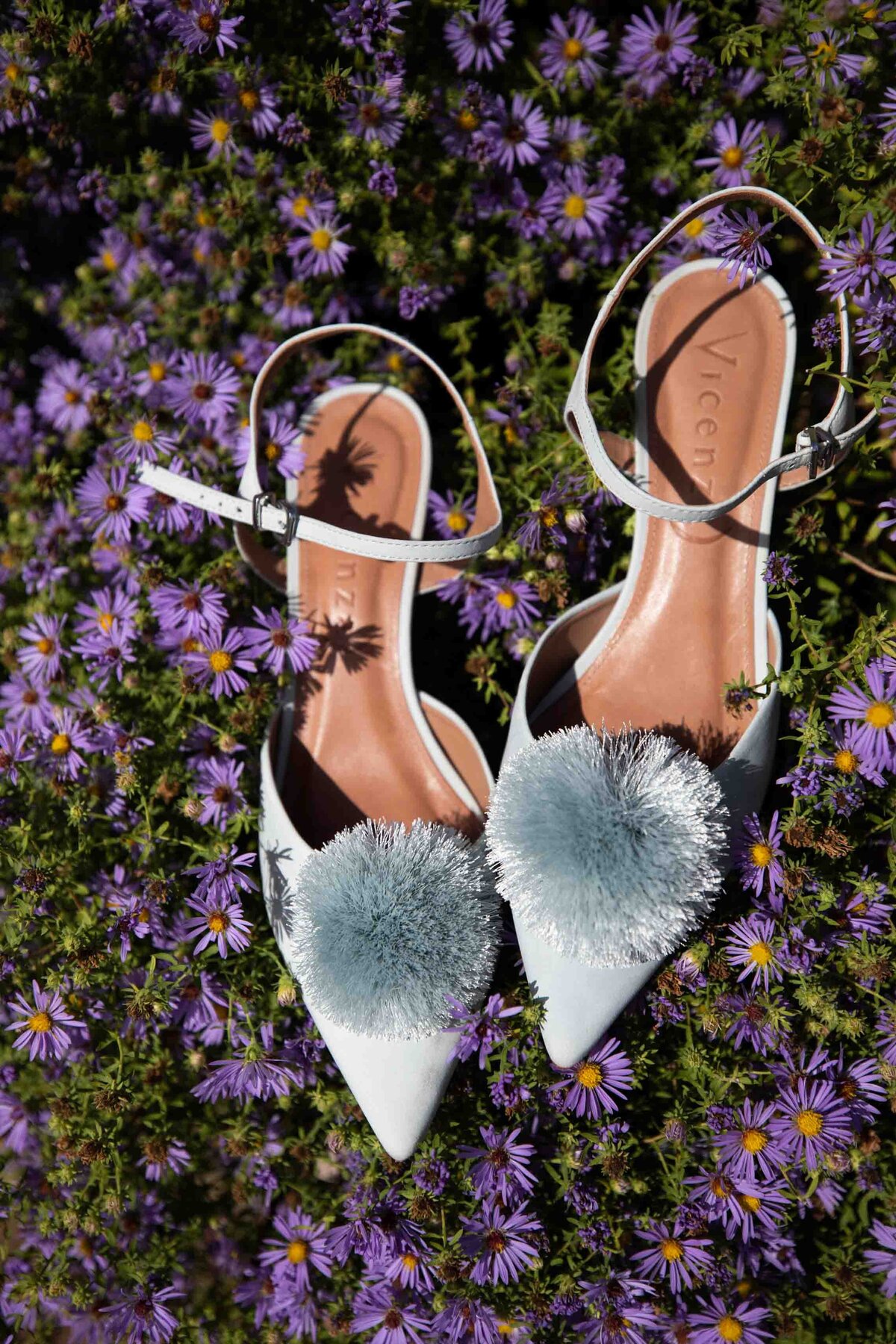 Vicenza brides shoes, resting in flowers at Zigbone Farm Retreat, Maryland