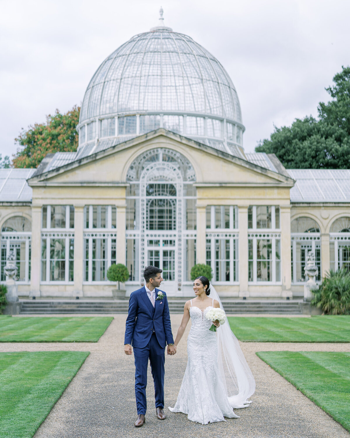 Bride and groom at glasshouse wedding in London wedding venue Syon Park