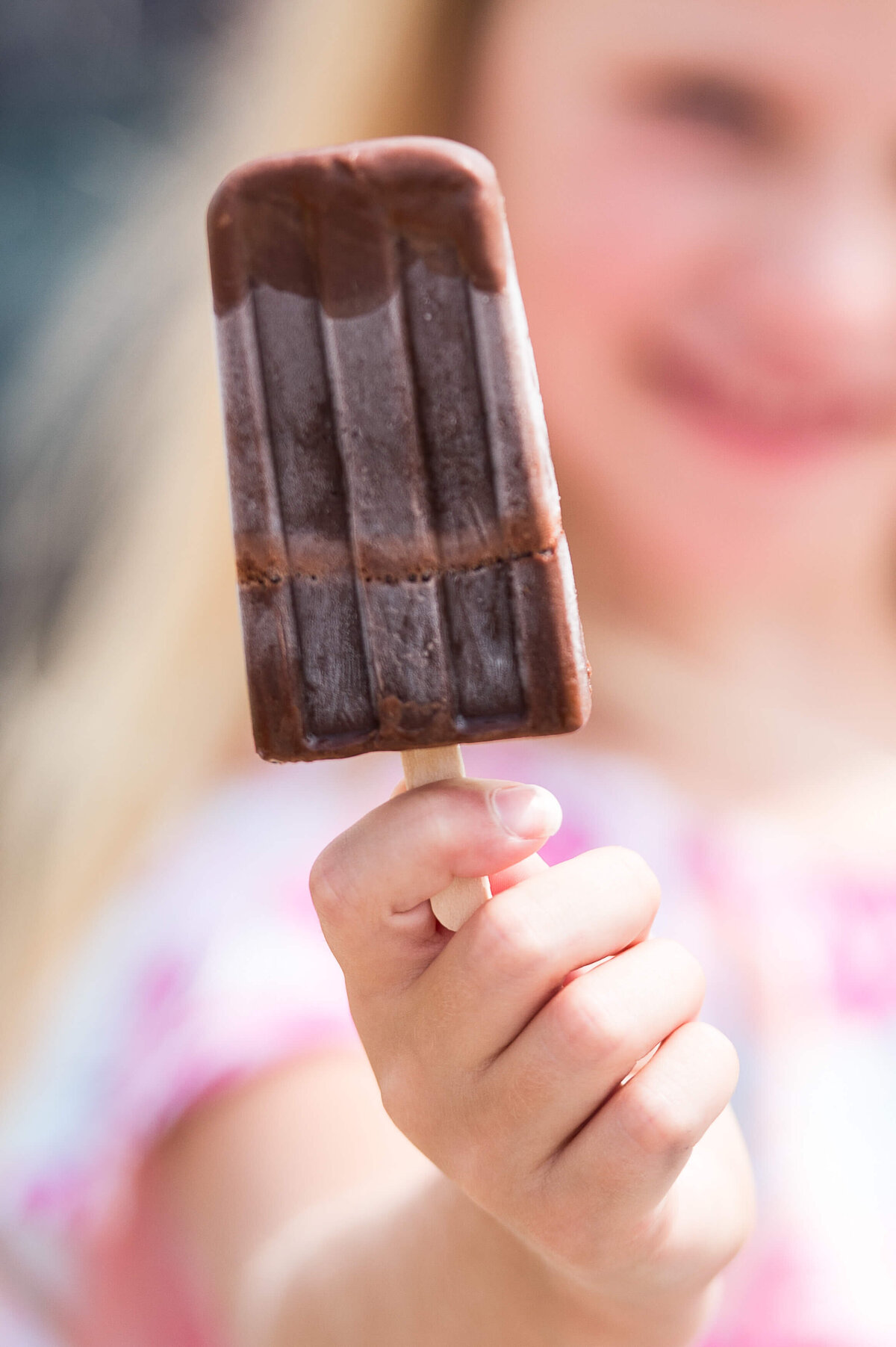 Ottawa event photos showing the popsicles given out to children during a corporate event.  Captured by JEMMAN Photography COMMERCIAL