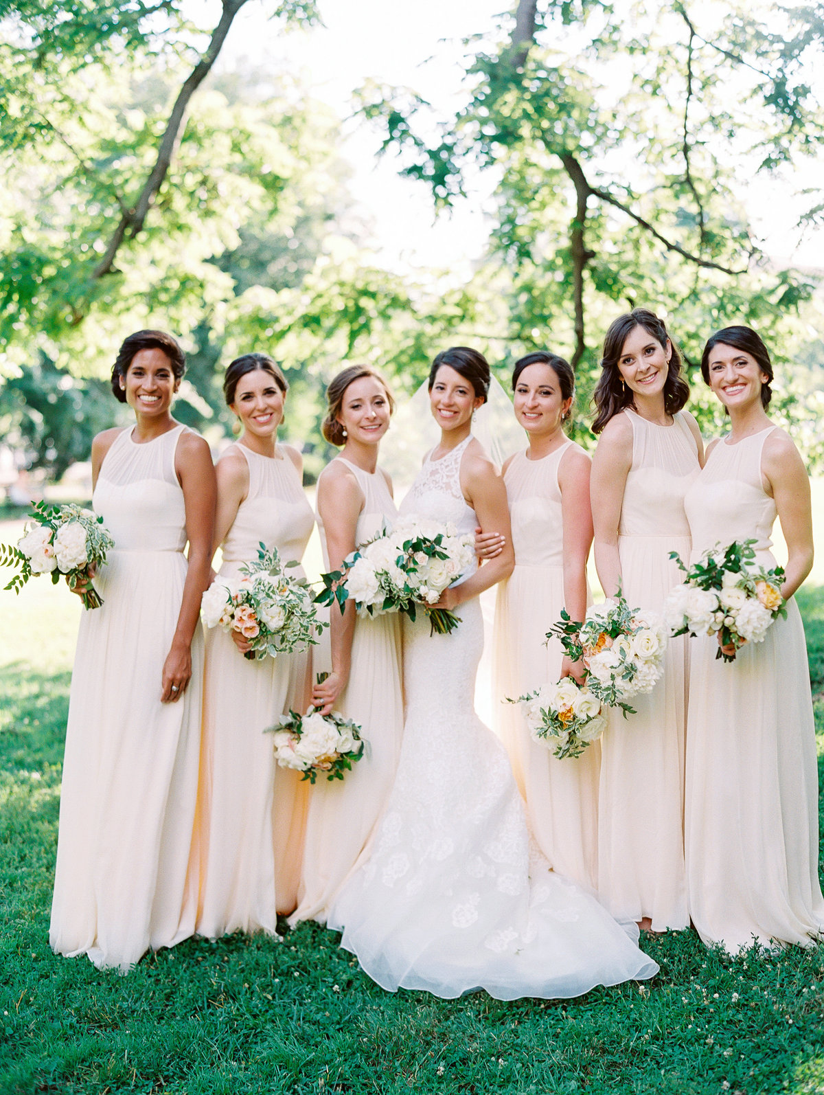 Bridesmaids in Cream Dresses with White and Green Bouquets © Bonnie Sen Photography