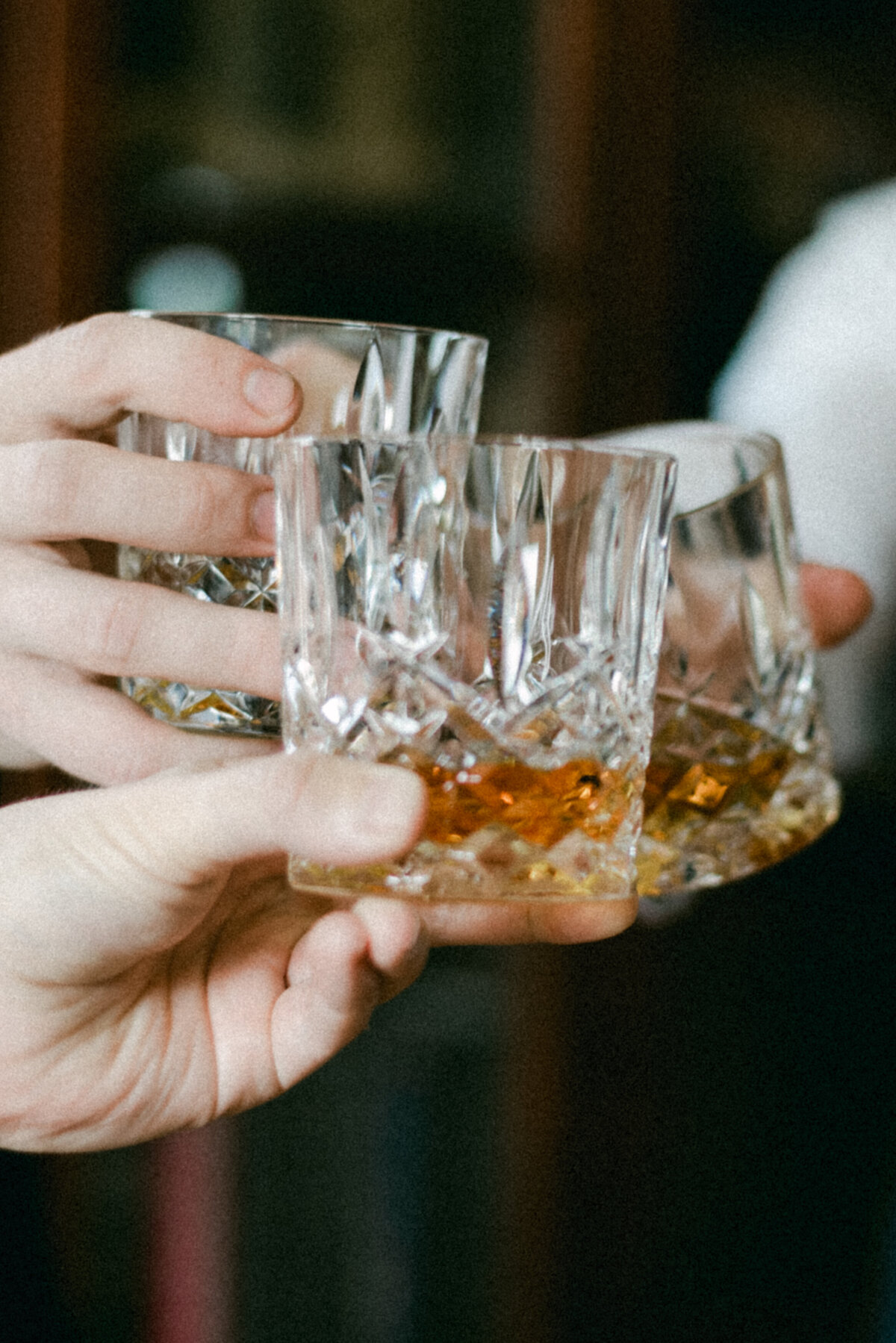 Glasses of whisky in an image captured by wedding photographer Hannika Gabrielsson.
