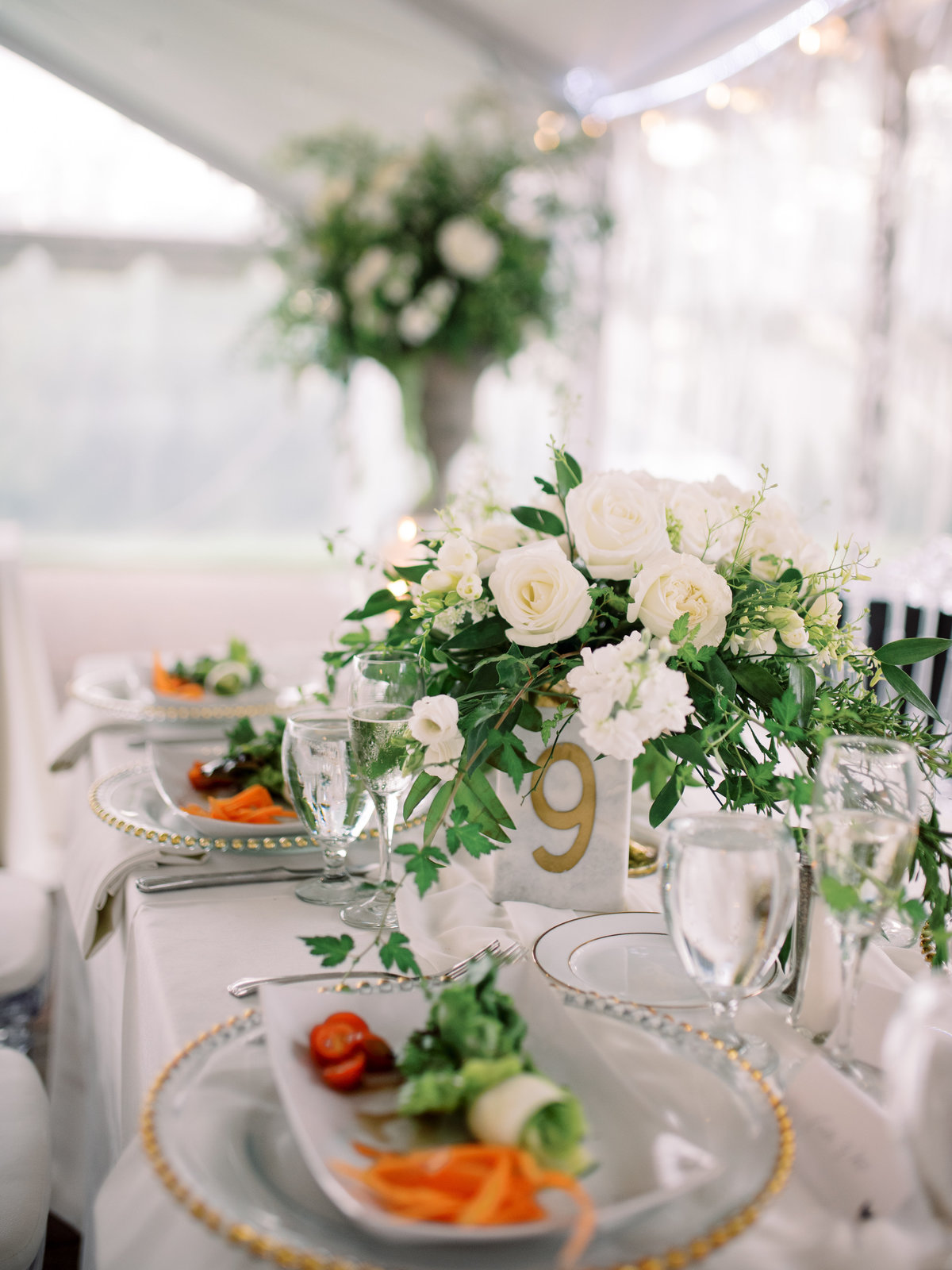 Floral centerpieces for reception in the tent at Oxon Hill Manor