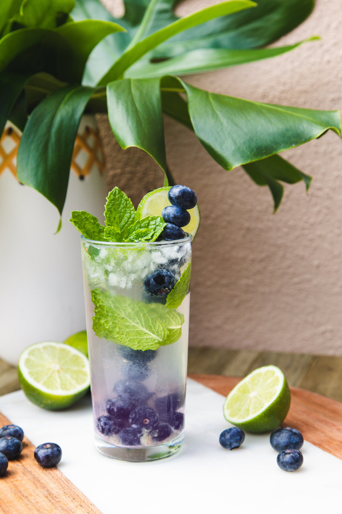 fresh blueberry mojito cocktail on an island lanai.