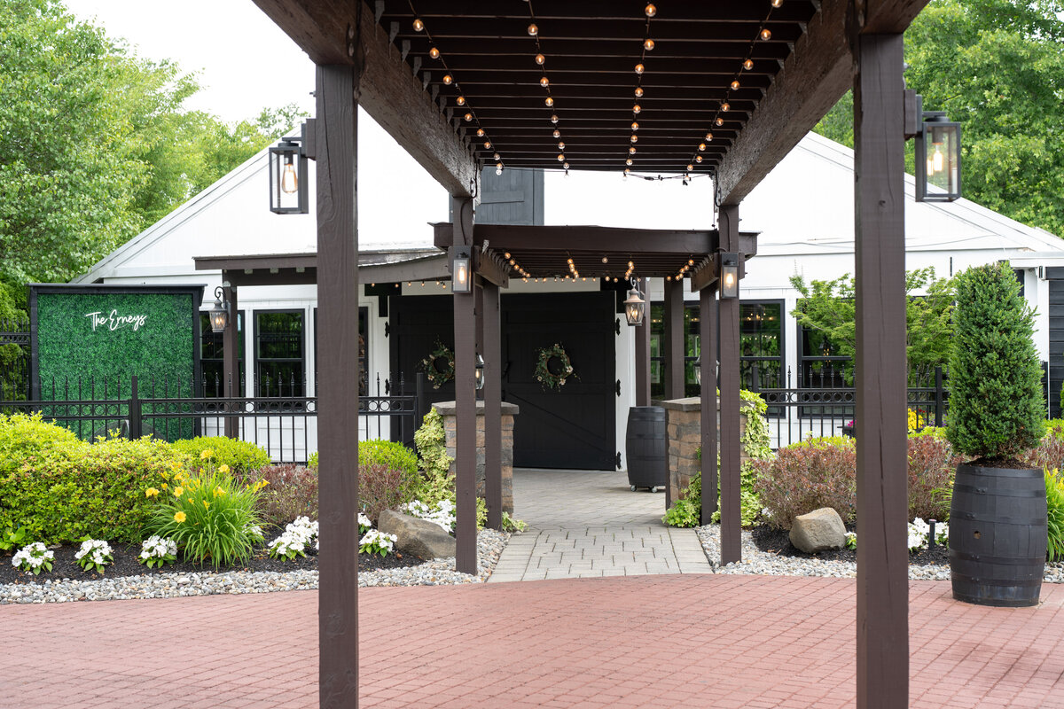 the covered entrance to the barn at hamilton manor ceremony