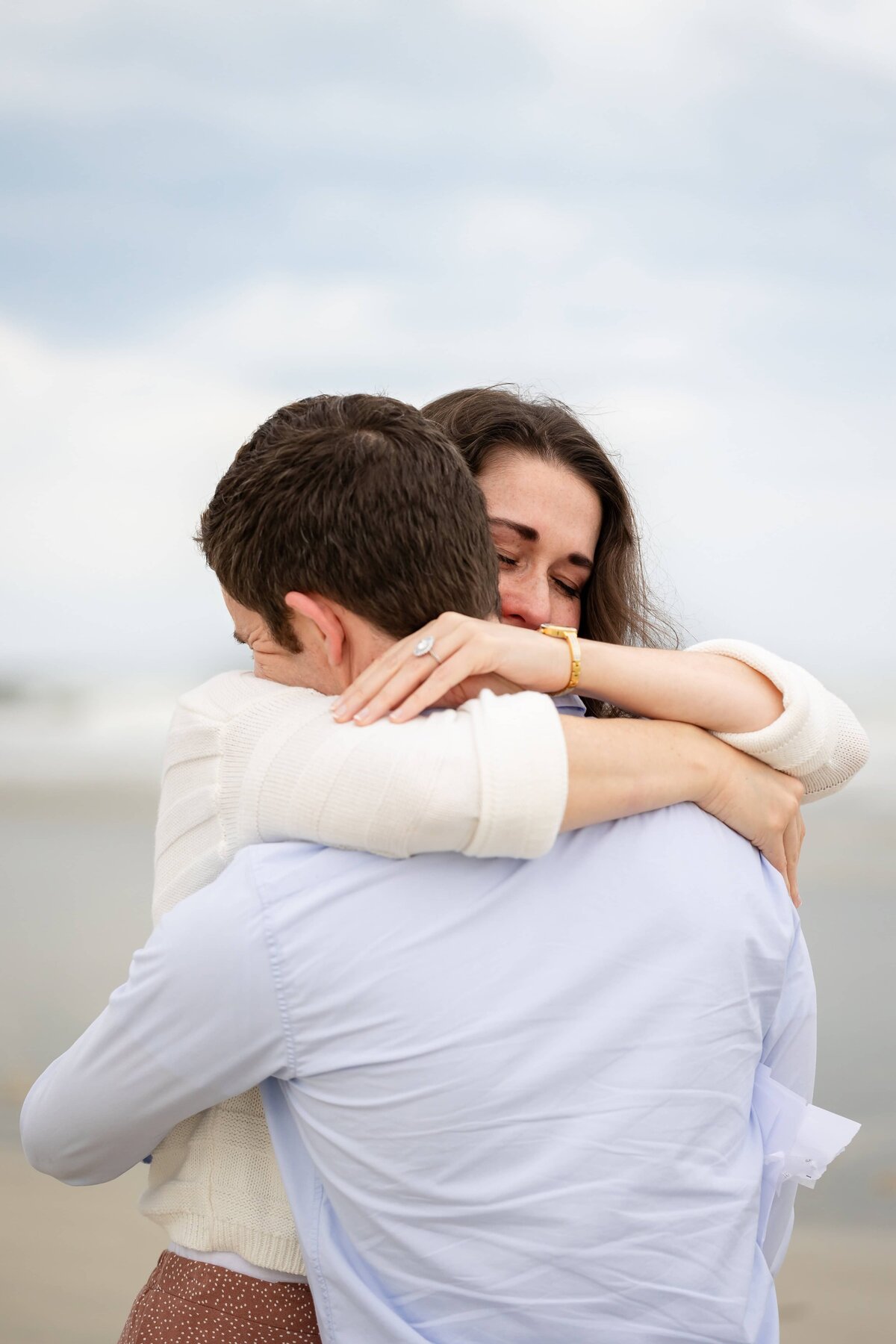 Heartfelt moments during a beach proposal in St. Augustine FL | Proposal Photos By Phavy, St. Augustine Proposal Photographer