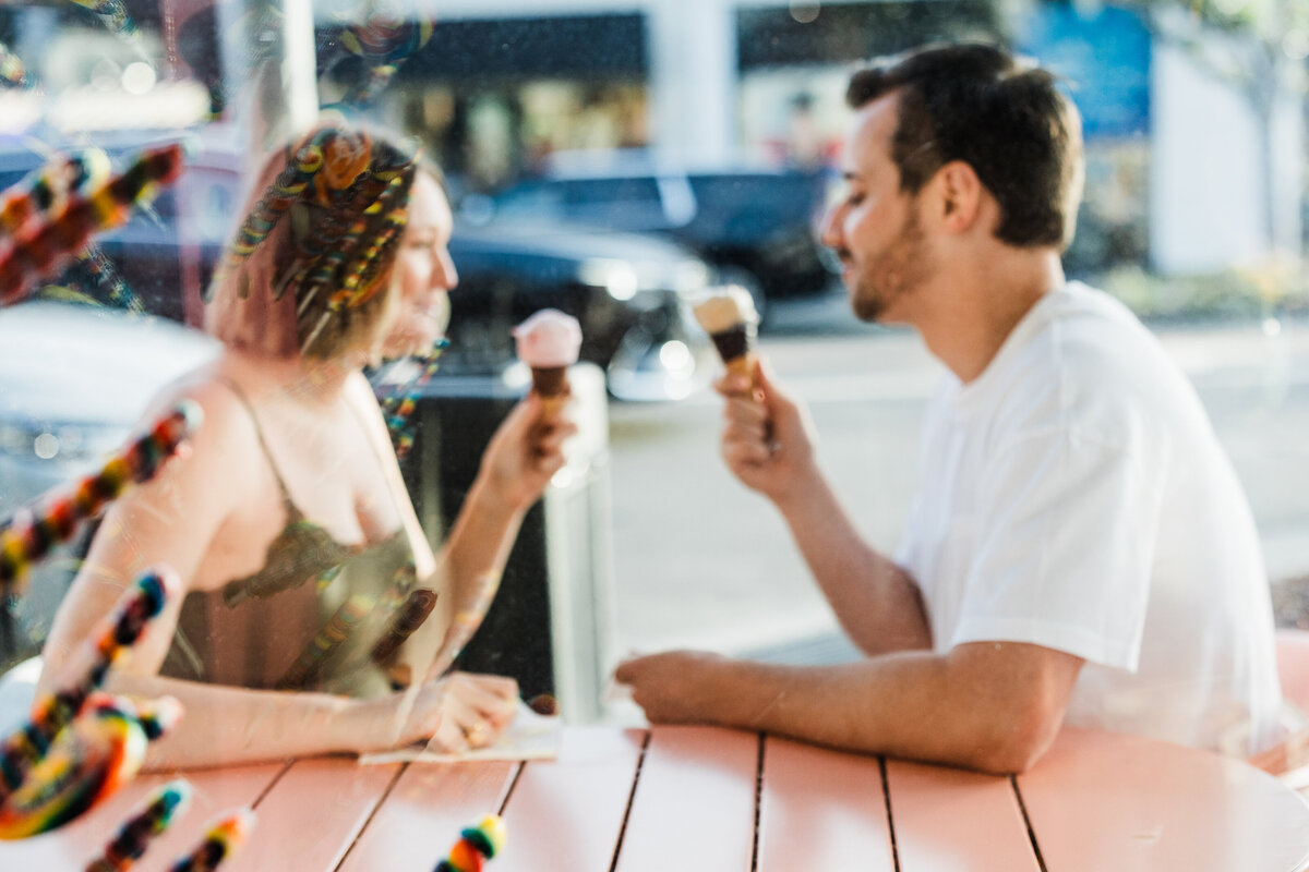 out-of-focus-couple-eating-ice-cream