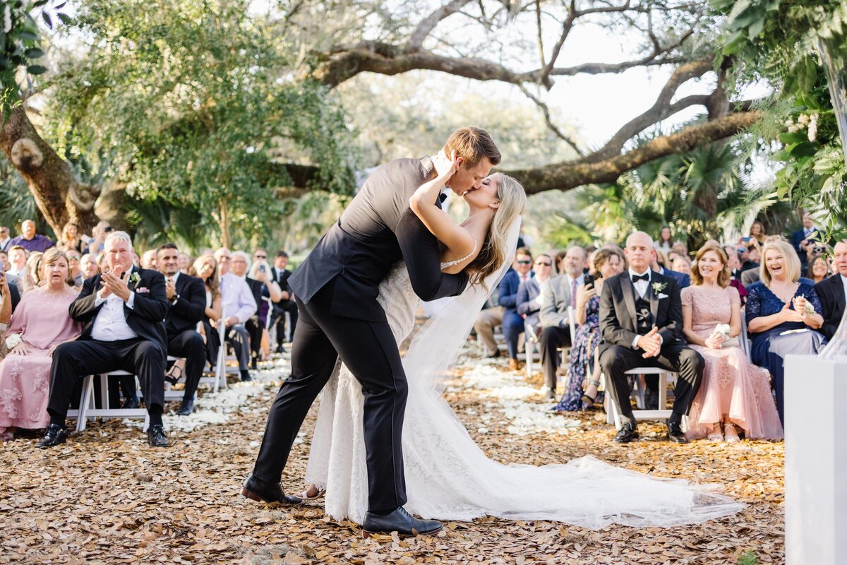 97 Verandah-club-wedding-ceremony-site-photographer-first-kiss-dip