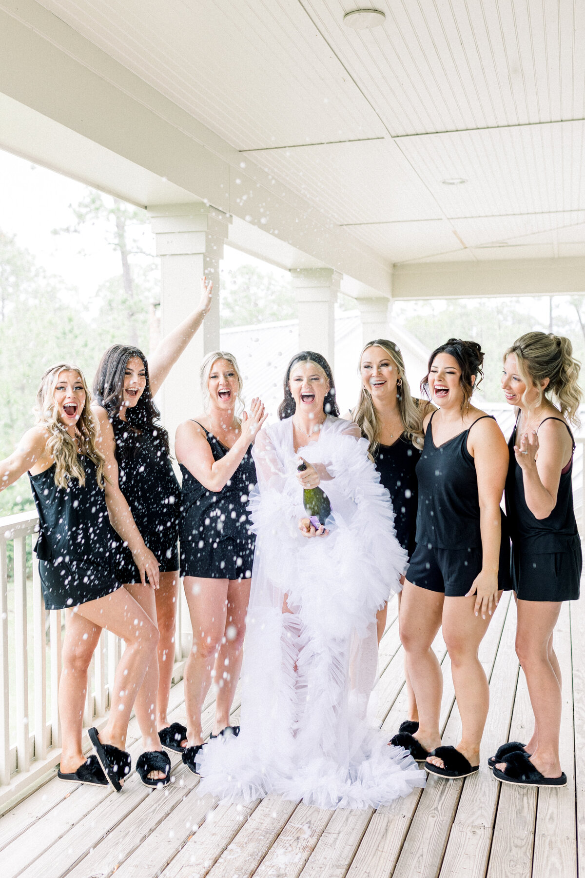 bride-bridesmaids-champagnepop.jpg